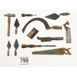 A set of 11 miniature tools as illustrated,