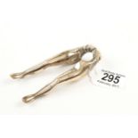 A pair of brass ladies legs nut crackers G+