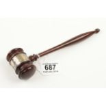 A fine rosewood gavel with silver band decoration G++