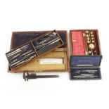 Two sets of drawing instruments a caliper and a hydrometer lacking thermometer G