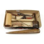 A collection of 11 sailmakers tools inc 16" boxwood fid,lignum sapwood serving mallet, seam rubber,
