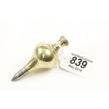 A 3 1/2" brass plumb bob stamped AM with Crown over F