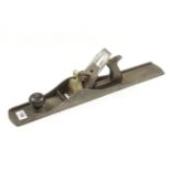 A heavy iron 22 1/2" jointer with brass lever G