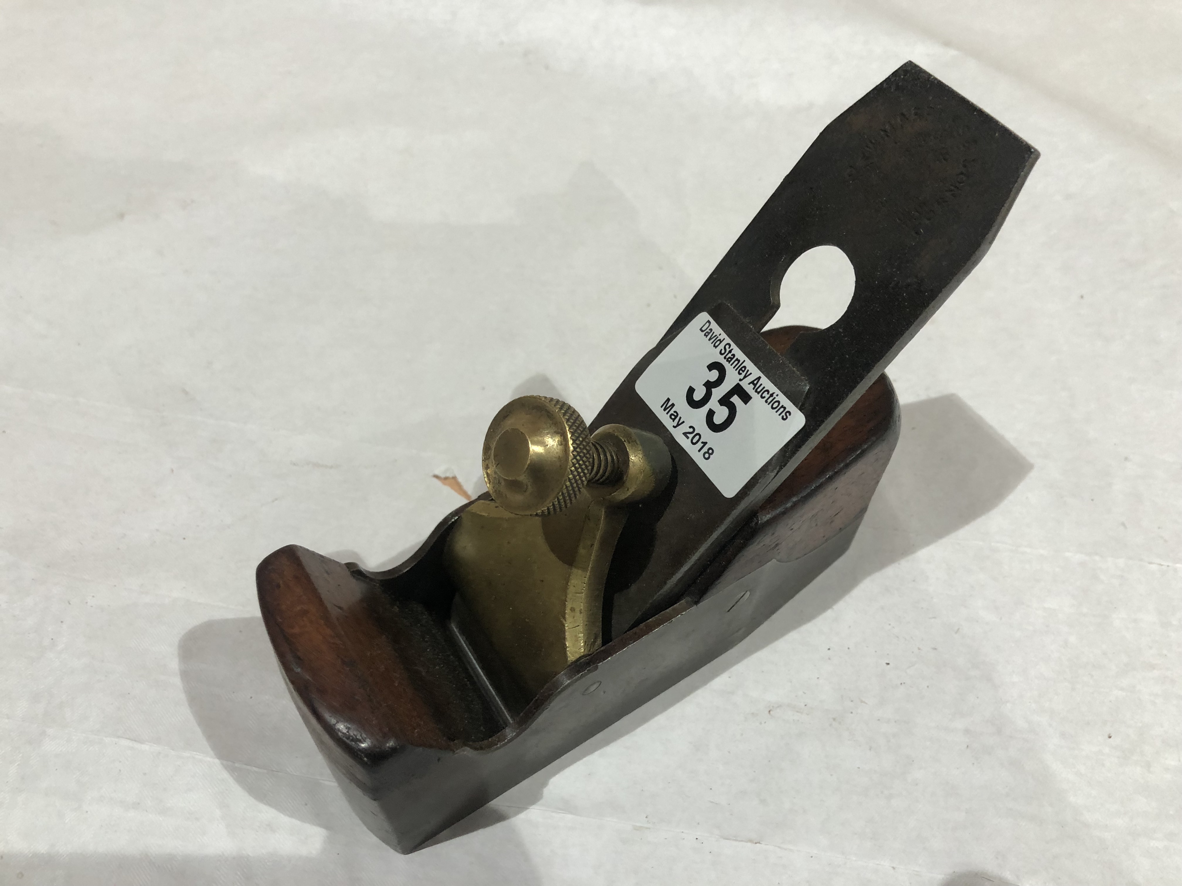 A small iron smoother with brass lever G+