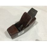 An iron smoother with mahogany infill G+