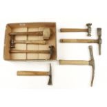 A brass headed mallet and six other hammers and small adze G+