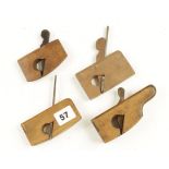 Two boxwood miniature compass rebate planes (one lacks iron) and two beech miniature planes (one