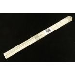 A rare 28" four fold ivory slide rule with German silver fittings marked in 16 Russian Archine