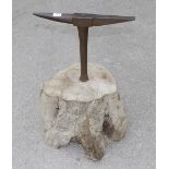 A 19" stake anvil with makers name set in heavy wood block G