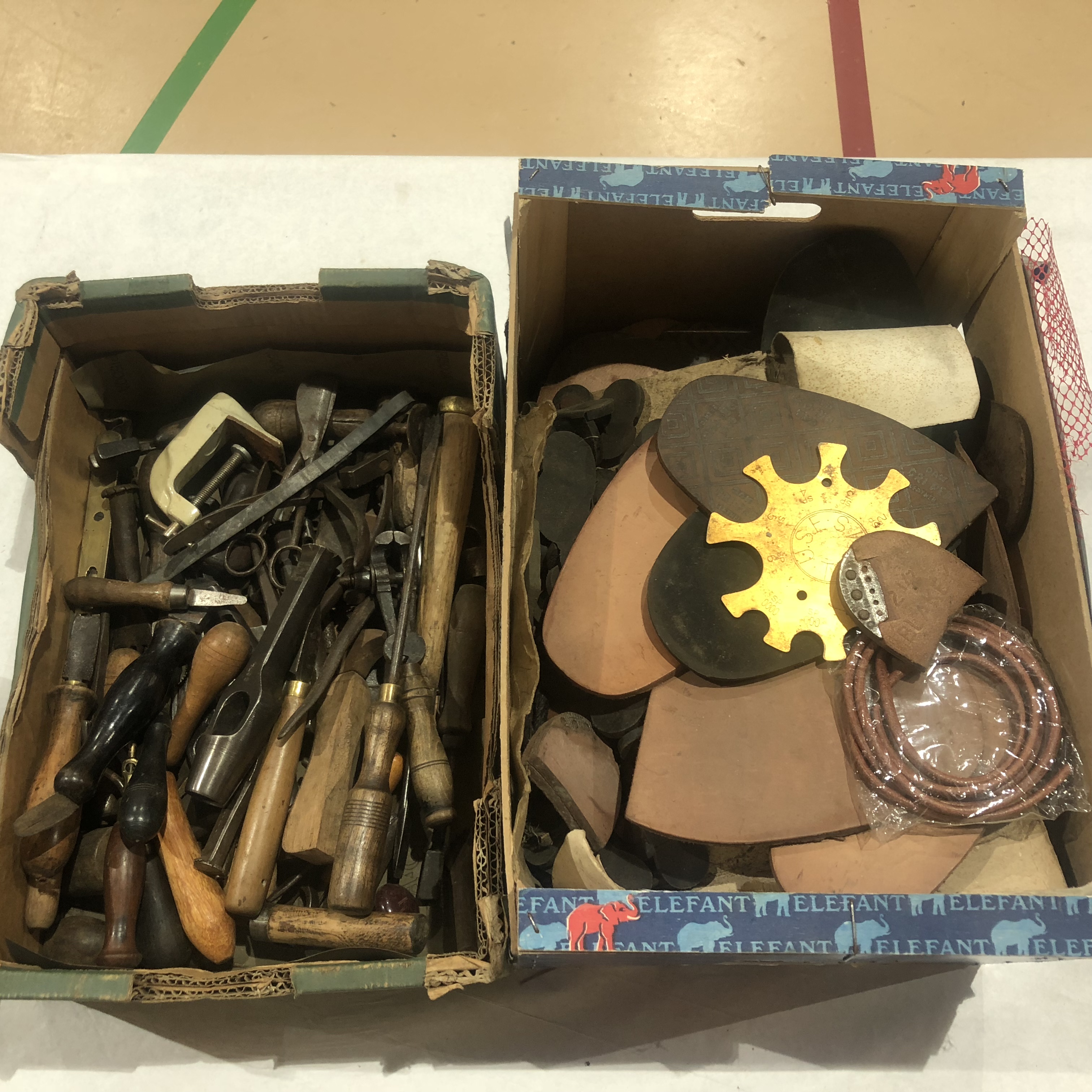 A quantity of leatherworkers and cobblers tools,