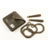 A hand chainsaw in leather pouch marked B&H 1908 G