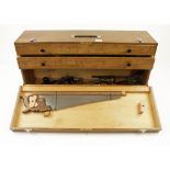 A jointer's carrying case with tools inc.