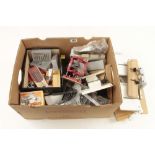 A quantity of router bits and attachments G+