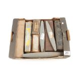 Five boxed oil stones plus various slip and other sharpening stones and 8 unused 6" taper saw files