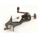 A bench mounted hand drill G