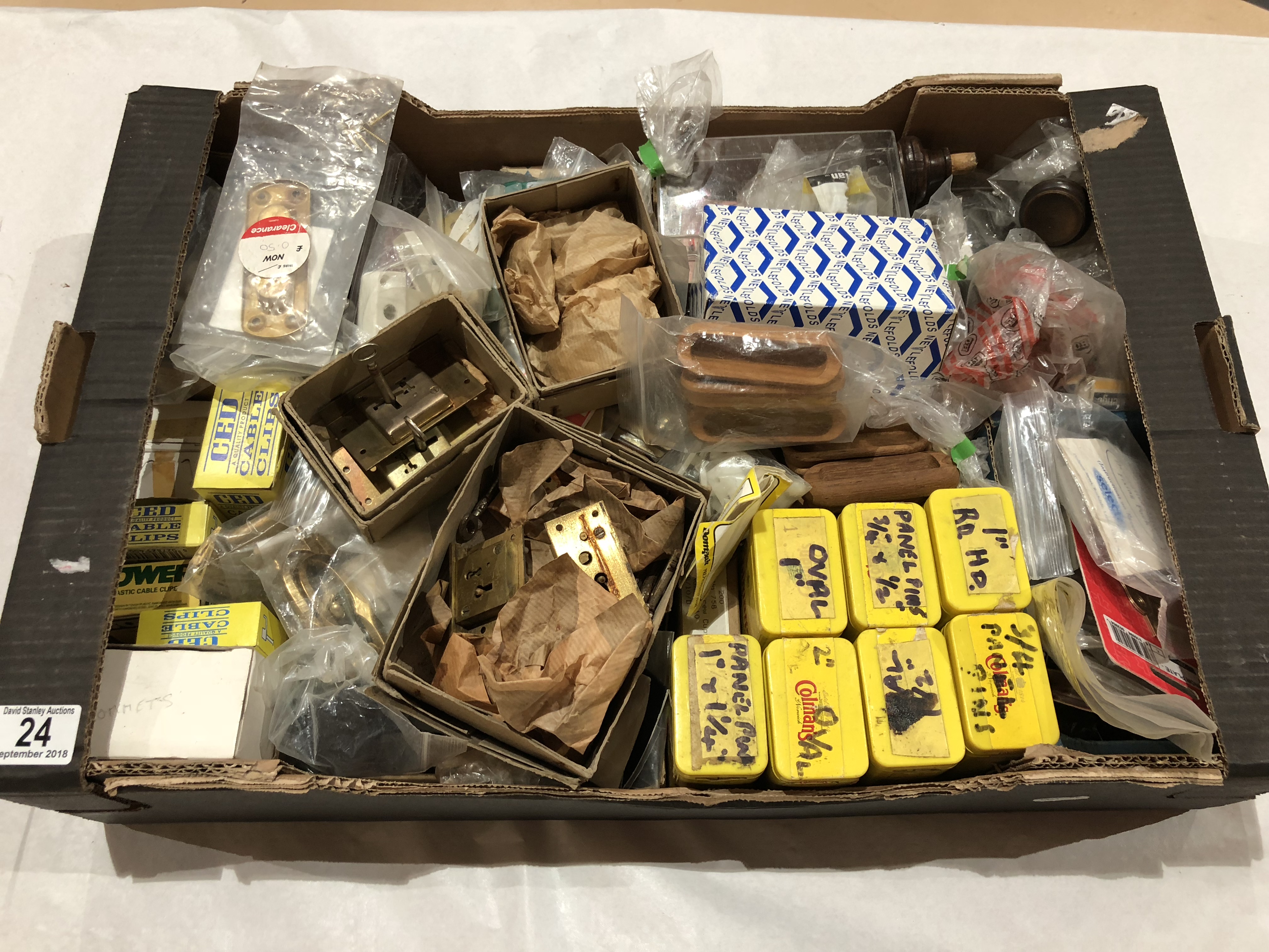 A box of brass cabinet and furniture fittings etc G