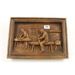 An attractive framed chip carving of two carpenters at their benches by CA MORAND 15" x 11" G+