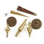 Four various brass plumb bobs G+