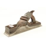 A quality 13" skew mouth iron panel plane with rosewood infill and handle and scrolled wedge,