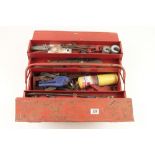 A cantilever tool box with various plumbers tools G