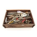 A box of tools inc snips, grips,