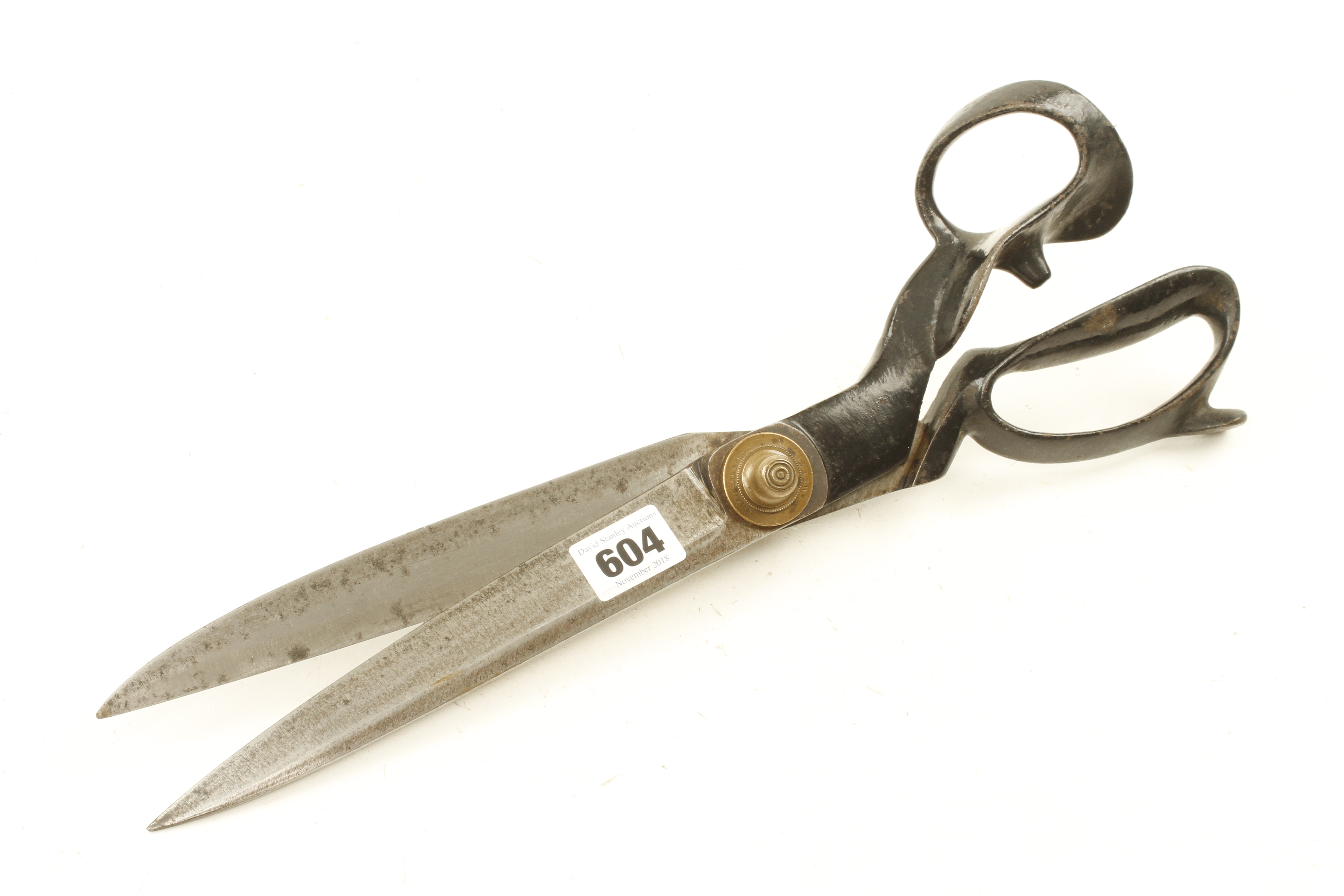 A pair of tailors shears by WILKINSON Sheffield G++