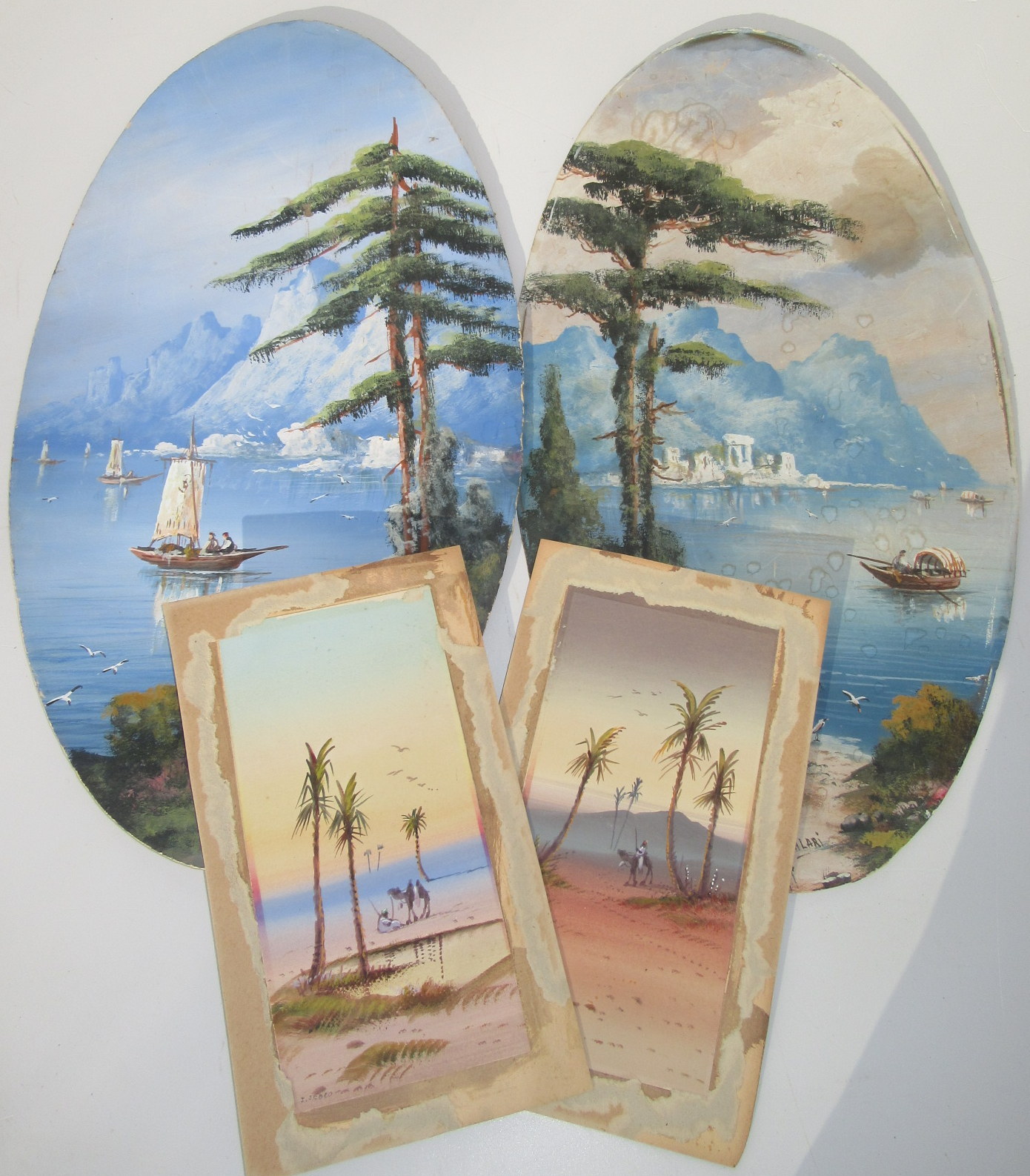 H SALARI A pair of Mediterranean coastal gouache Together with a pair of desert scenes signed