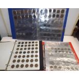 Three plastic albums containing World Coins, a little silver including G.B. silver 3d pieces.