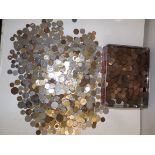 A large and heavy accumulation of World coins.