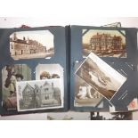 An Edwardian album containing approximately 150 postcards including several better Cornish R.P.