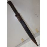 A German 1884/98 Alexander Coppel Solingen 10" bayonet, outer case fixed firmly to the blade.