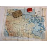 A 1914 Queen Mary gift tin, a T.A. lapel badge and silk map of Siam, Malaya and Sumatra.