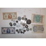 Miscellaneous world coins and banknotes.