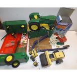 A Die-cast John Deere tractor and two trailers by ERTL, Meccano etc.