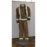A R.A.F. fire crew uniform with sargeants cloth badge and torch.