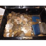 A bank box containing a heavy accumulation of mainly British copper.