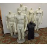 Two female and three male mannequins with metal stands and detachable arms,