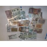 53 British and foreign bank notes in British £5 (5).