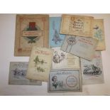 Cigarette cards laid down in original albums.