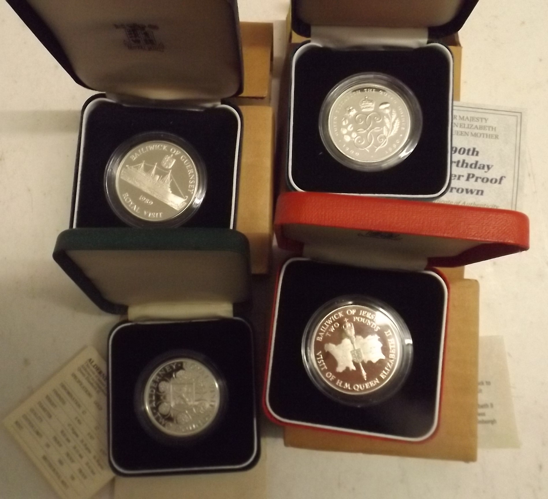 Four crown size silver coins:- Jersey £2 1989, Alderney £2 1989,