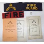 Fireguard and civil defence arm bands, button and 1939 booklets.