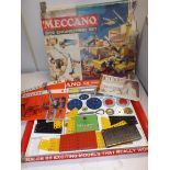 A part Meccano set in yellow, red and black, box damaged.