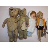 Two vintage teddy bears, largest 14", together with three dolls.
