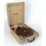 A Wondertone portable gramophone, height 15.3cm, width 29.2cm, length 38.3cm.