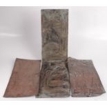 A set of four Arts and Crafts rectangular copper plaques, repousse decorated with reeds,
