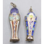 Two Egyptian silver enamelled sarcophagus charms each opens to reveal an enamelled gilt mummy.