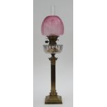 A Victorian brass corinthian column oil lamp, Evered's No.