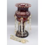 A Victorian ruby glass lustre, height 32.5cm, diameter of top 15cm.