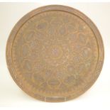 A Syrian brass and silver inlaid circular tray, 19th century,