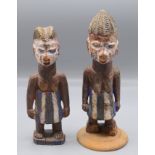 Two Nigerian (Yoruba) wooden figures, early 20th century,